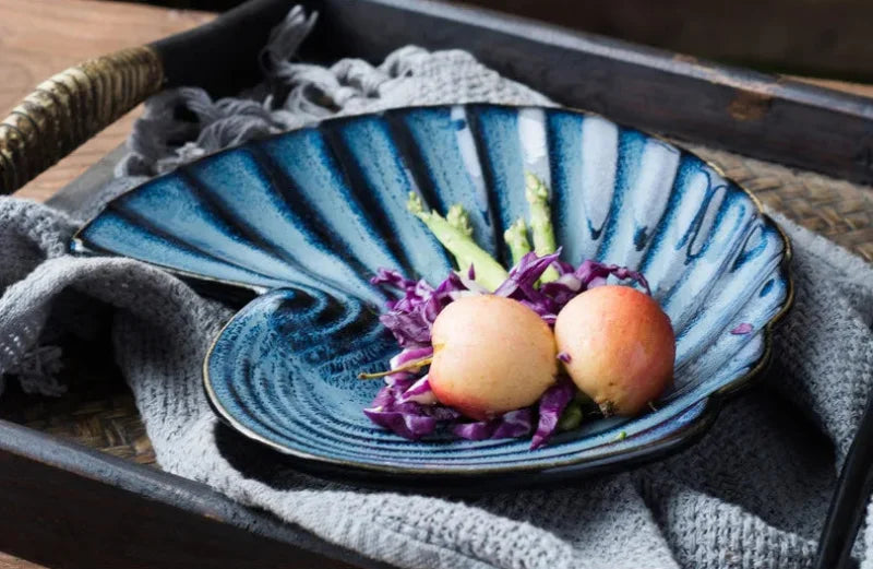 <strong>Ocean Whirl Keramikteller – Einzigartige Muschelform für Küstenkunst</strong> 8